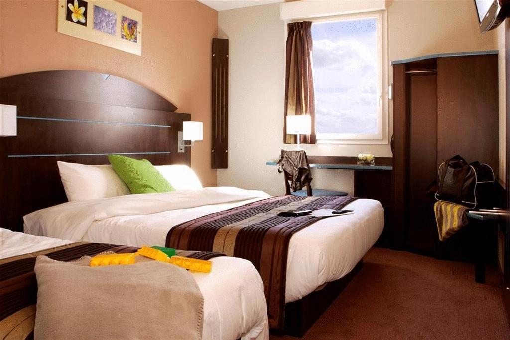 Hotel Akena City Caudry Экстерьер фото
